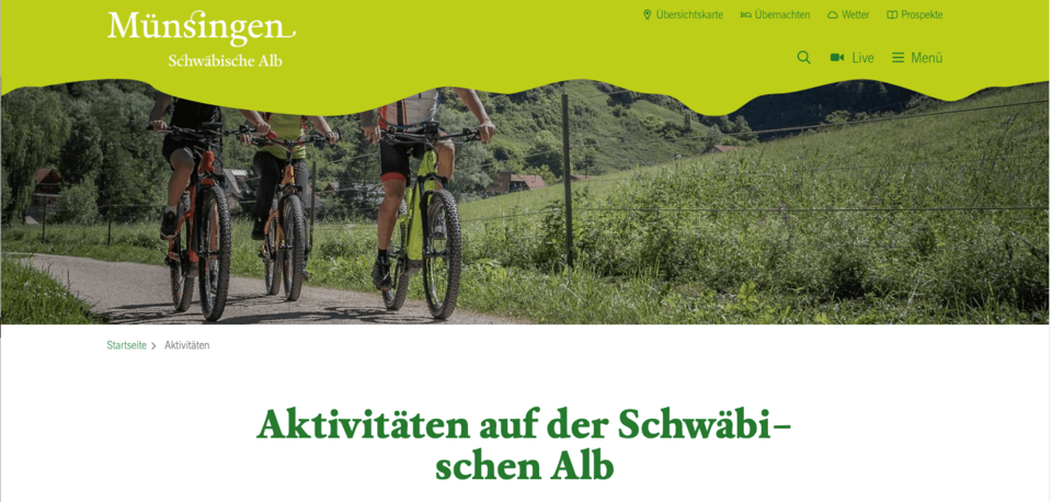 Dekoration am Header, der beim Scrollen sichtbar wird auf https://www.muensingen.com/
